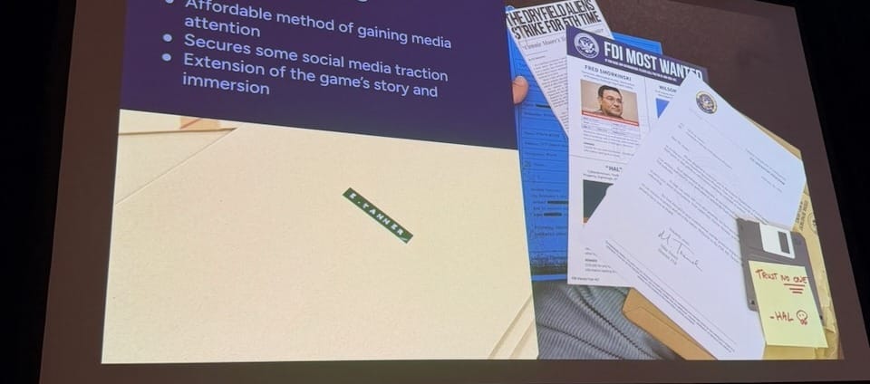 Physical FBI media kit — manila envelope addressed to E. Tanner, FDI Most Wanted poster, documents, and a floppy disk labeled "Trust No One — HAL"